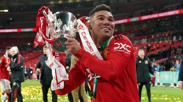 Casemiro celebrates with the Carabao Cup trophy