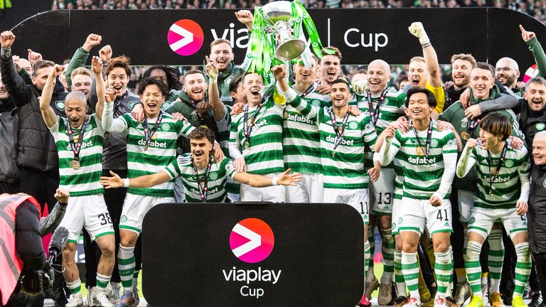 Celtic captain Callum McGregor lifts the Viaplay cup trophy