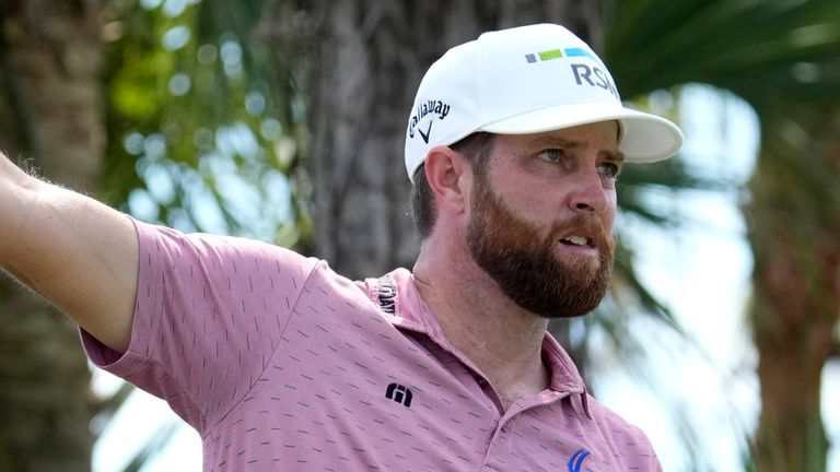 Chris Kirk gestures after hitting from the second tee during the third round of the Honda Classic 