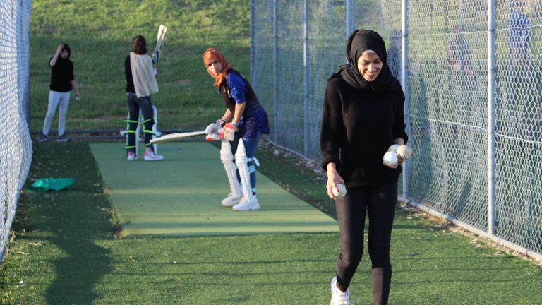 Nafiza Amiri (front) going through some bowling drills during a nets session