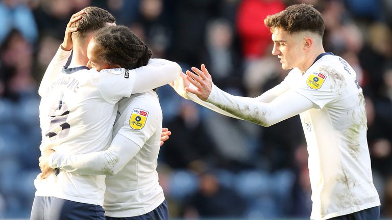 Preston's Daniel Johnson celebrates with team-mates Alan Browne (left) and Troy Parrott