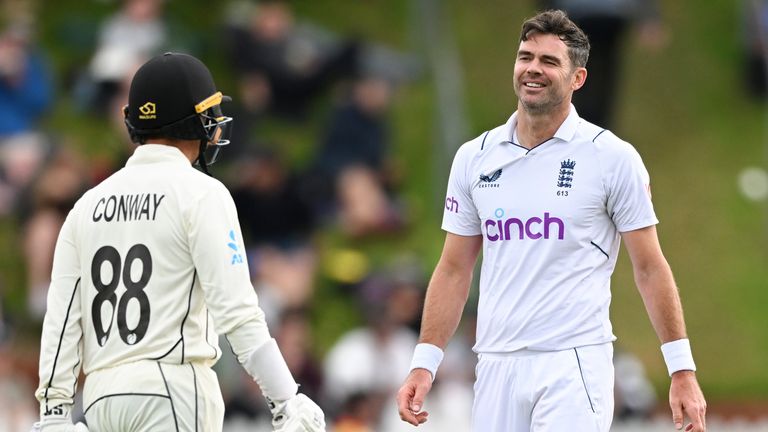 Devon Conway, left, of New Zealand talks to England bowler James Anderson on day three of the second cricket test between England and New Zealand at the Basin Reserve in Wellington, New Zealand, Sunday, Feb. 26, 2023. (Andrew Cornaga/Photosport via AP)