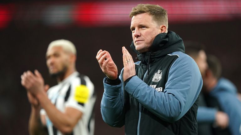 Eddie Howe applauds the Newcastle supporters at full time