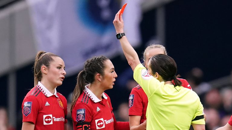 Ella Toone receives a red card after reacting to a foul