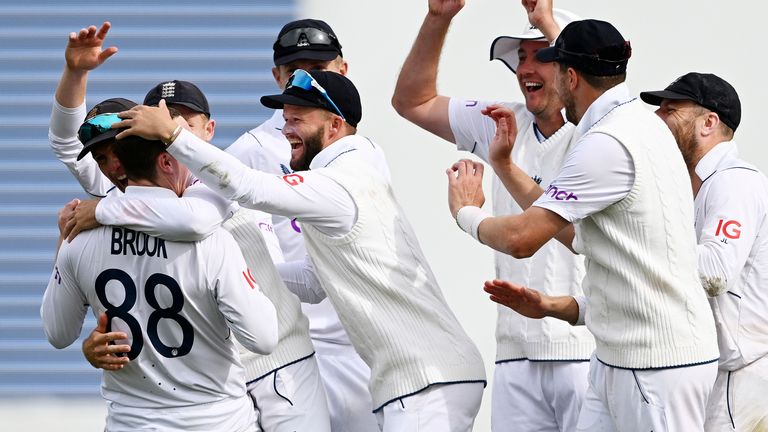 England's Harry Brook, second left, is congratulated by teammates after taking the wicket of New Zealand's Kane Williamson on day 4 of their cricket test match in Wellington, New Zealand, Monday, Feb 27, 2023. (Andrew Cornaga/Photosport via AP)