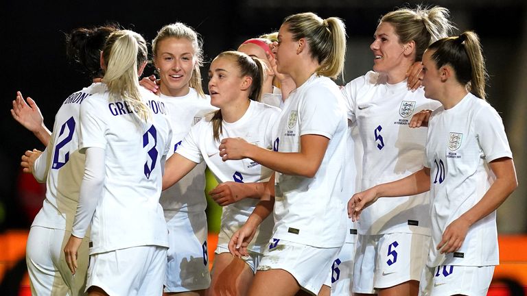England's Leah Williamson (third from left) celebrates with her teammates after scoring against Belgium