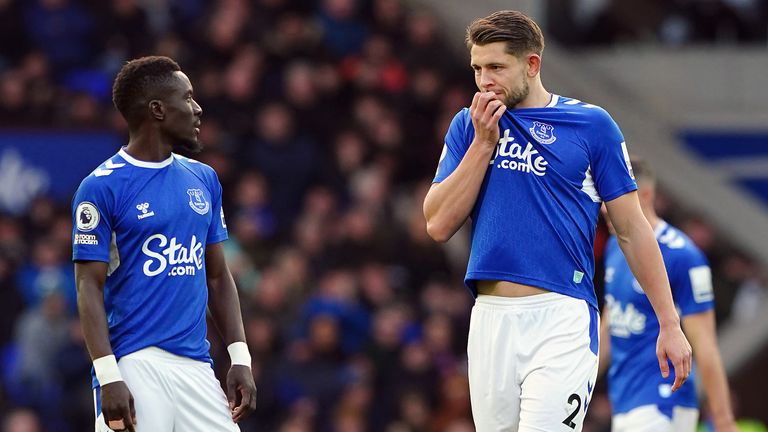 Everton players react after conceding