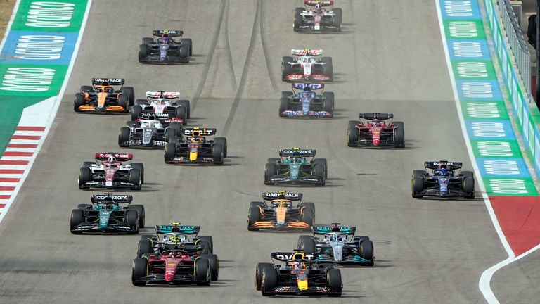 Red Bull driver Max Verstappen, of the Netherlands, leads the field into Turn 1 at the start of the Formula One U.S. Grand Prix auto race at the Circuit of the Americas, Sunday, Oct. 23, 2022, in Austin, Texas. (AP Photo/Eric Gay)