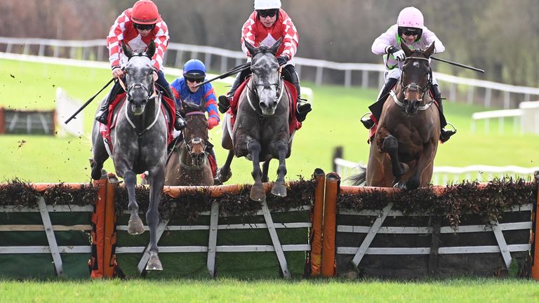 Fil Dor and Jordan Gainford (left) win the Red Mills Trial Hurdle from Sharjah (right) and Doctor Bravo (centre)