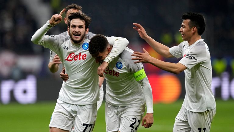 Napoli&#39;s Giovanni Di Lorenzo celebrates with team-mates after scoring his side&#39;s second goal against Eintracht Frankfurt 