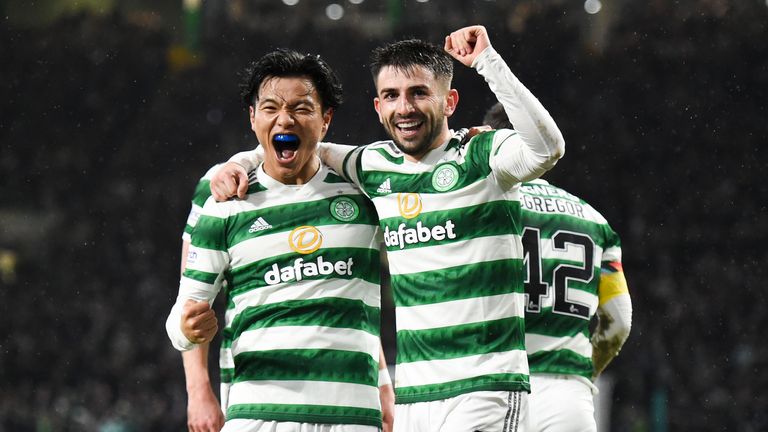 GLASGOW, SCOTLAND - FEBRUARY 01: Celtic's Greg Taylor celebrates with Reo Hatate as he makes it 1-0 during a cinch Premiership match between Celtic and Livingston at Celtic Park, on February 01, 2023, in Glasgow, Scotland. (Photo by Ross MacDonald / SNS Group)