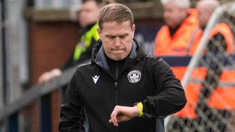 KIRKCALDY, SCOTLAND - FEBRUARY 11: Motherwell Manager Steven Hammell looks at his watch during a Scottish Cup match between Raith Rovers and Motherwell at Stark&#39;s Park, on February 11, 2023, in Kirkcaldy, Scotland. (Photo by Craig Foy / SNS Group)