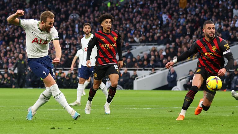 Harry Kane slots home against Manchester City to become Spurs' leading all-time goalscorer
