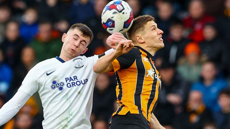 Ben Woodburn battles with Greg Docherty