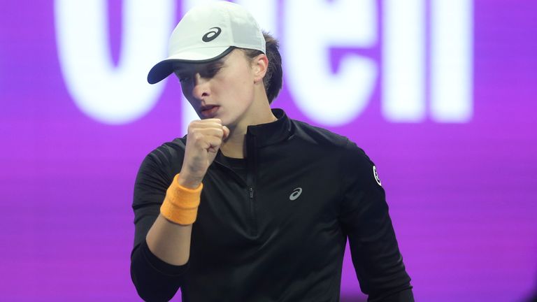 Iga Swiatek of Poland reacts Jduring her match against Jessica Pegula of the United States at the e final of the Qatar Open WTA tennis tournament in Doha, Qatar, Saturday, Feb. 18, 2023. (AP Photo/Hussein Sayed)