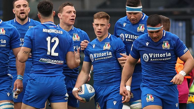 Italy hit back quickly through a Stephen Varney (centre) try 