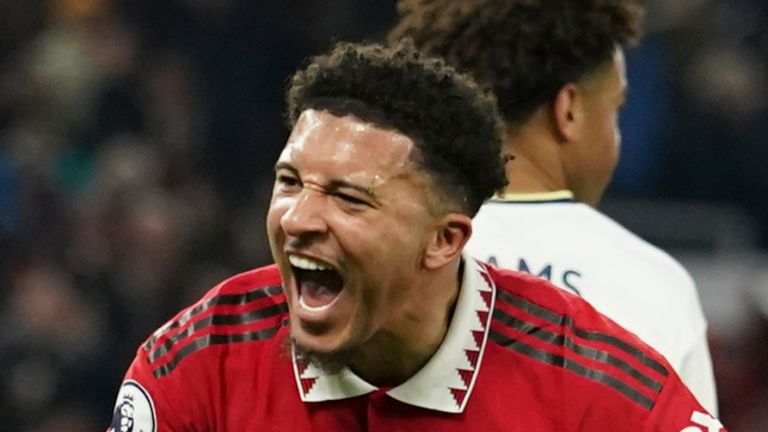 Manchester United&#39;s Jadon Sancho celebrates after scoring his sides second goal during the English Premier League soccer match between Manchester United and Leeds United at Old Trafford in Manchester, England, Wednesday, Feb. 8, 2023. (AP Photo/Dave Thompson)