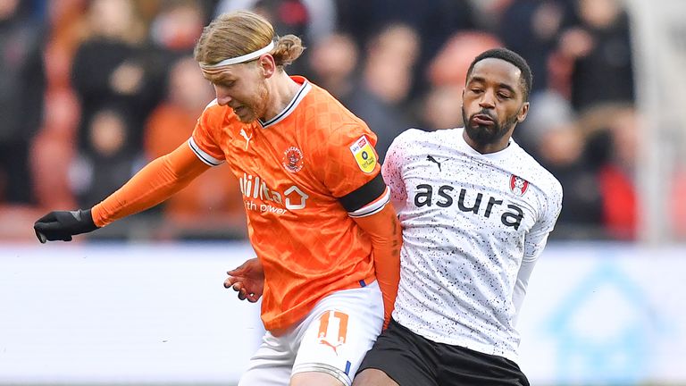 Blackpool's Josh Bowler battles with Rotherham United's Tariqe Fosu