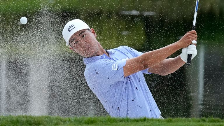 Justin Suh hits onto the 16th green during the second round of the Honda Classic golf tournament, Friday, Feb. 24, 2023, in Palm Beach Gardens, Fla. (AP Photo/Lynne Sladky)