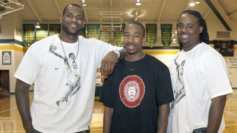  LeBron James, Dru Joyce III, and Willie McGee, appear in their high school gym on Friday, Aug. 21, 2009 to promote the documentary film "More Than A Game" 