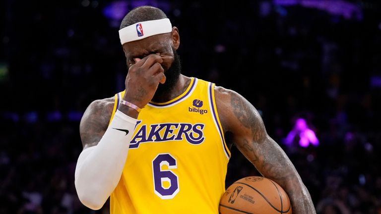An emotional LeBron James reacts after breaking Kareem Abdul-Jabbar's all-time points record