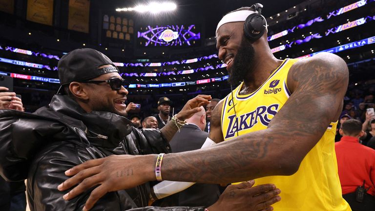 LeBron James is congratulated by Usher
