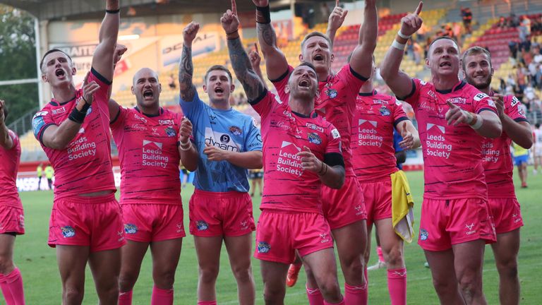 Leeds' players celebrate following the golden-point win over Catalans last July
