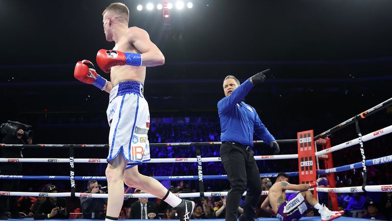 GLENDALE, ARIZONA - FEBRUARY 03: Liam Wilson (L) knocks-down Emanuel Navarrete (R) during their vacant WBO junior lightweight championship fight at Desert Diamond Arena on February 03, 2033 in Glendale, Arizona. (Photo by Mikey Williams/Top Rank Inc via Getty Images)