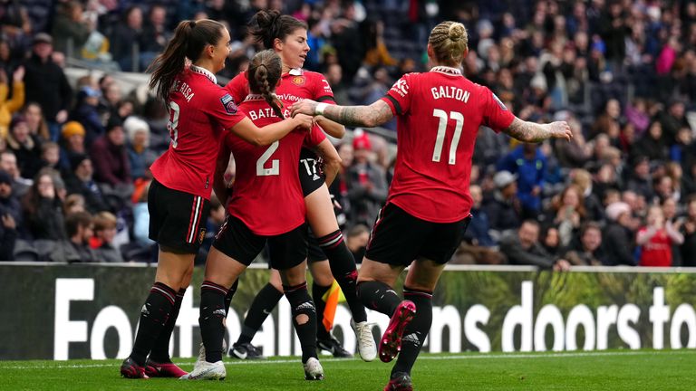 Manchester United players celebrate their side&#39;s second goal of the game, an own goal by Tottenham&#39;s Molly Bartrip (not pictured)