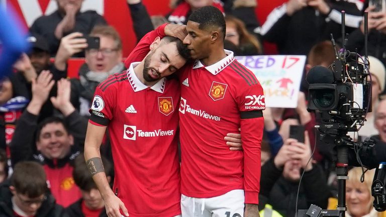 Marcus Rashford celebrates his opening goal against Leicester City with team-mate Bruno Fernandes