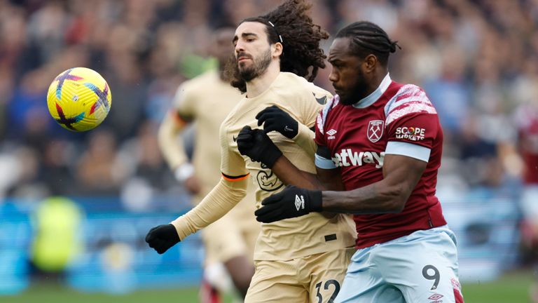 Chelsea&#39;s Marc Cucurella challenges for the ball with West Ham&#39;s Michail Antonio