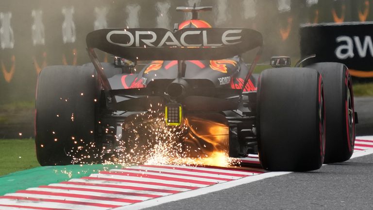 Sparks fly as Red Bull driver Max Verstappen of the Netherlands steers his car during practice session at the Japanese Formula One Grand Prix at the Suzuka Circuit in Suzuka, central Japan, Saturday, Oct. 8, 2022. (AP Photo/Toru Hanai)