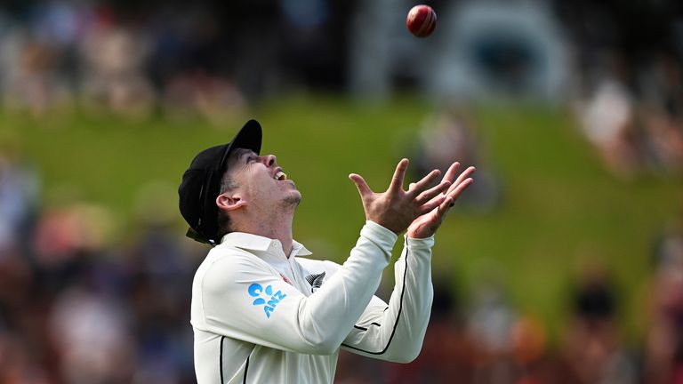 New Zealand&#39;s Michael Bracewell catches out England&#39;s Ollie Robinson on day 5 of their cricket test match in Wellington, New Zealand, Tuesday, Feb 28, 2023. (Andrew Cornaga/Photosport via AP)