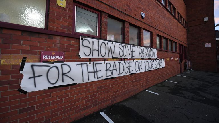 Motherwell fans placed a banner outside Fir Park after the defeat at Aberdeen