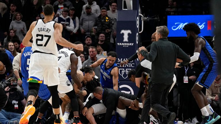 A scrum breaks out between Minnesota Timberwolves and Orlando Magic players during the second half of an NBA basketball game, Friday, Feb. 3, 2023, in Minneapolis. (AP Photo/Abbie Parr)



