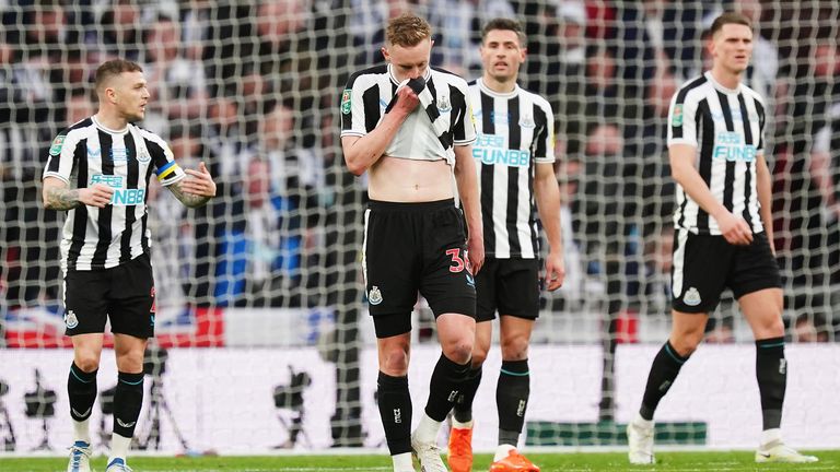Newcastle players appear dejected after going two goals behind in the first half