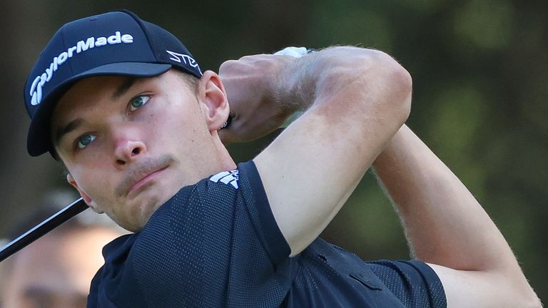 Denmark's Nicolai Hojgaard tees off on the 16th hole during the Australian Open golf championship at Kingston Heath golf course in Melbourne, Australia, Friday, Dec. 2, 2022. (AP Photo/Asanka Brendon Ratnayake)