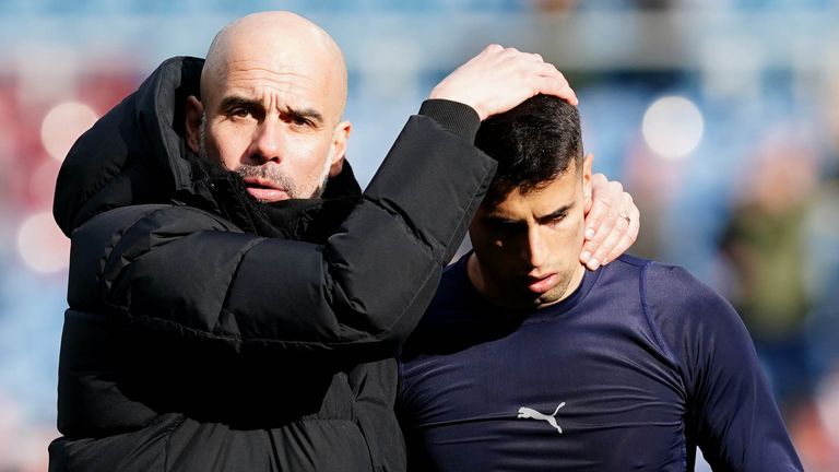 Manchester City manager Pep Guardiola (left) and Joao Cancelo, who has played down suggestions a rift with Guardiola prompted his surprise deadline-day loan move to Bayern Munich. 