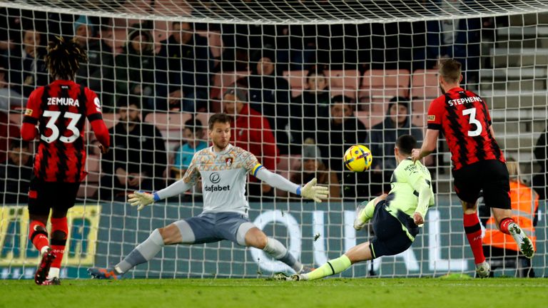 Manchester City's Phil Foden scores their third goal