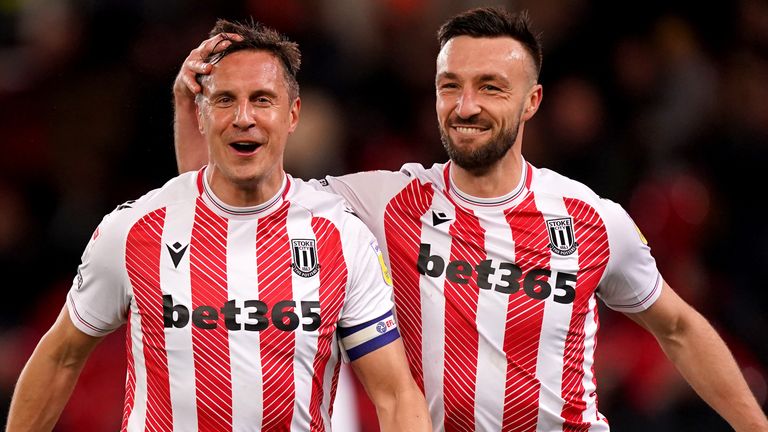 Stoke City's Phil Jagielka (left) celebrates scoring against Huddersfield