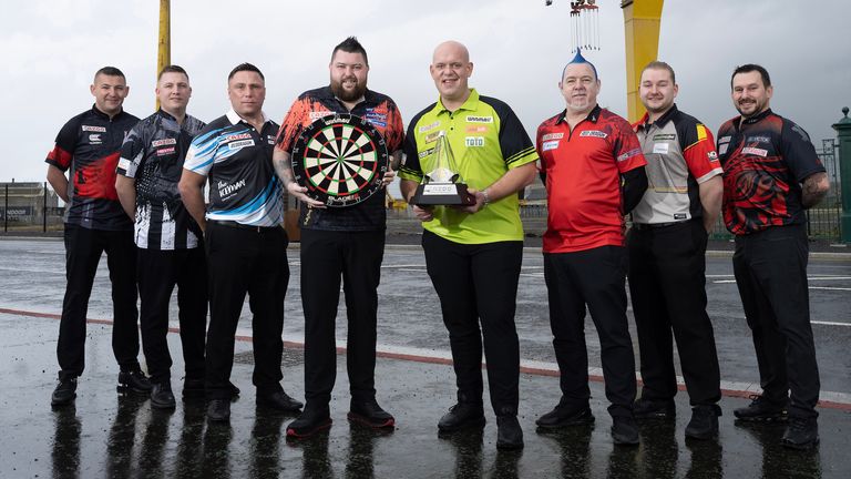 REPRO FREE.1/2/23: Stars of the Cazoo Premier League darts gather outside the iconic Goliath crane at the Harland & Wolff shipyard in Belfast ahead of Thursday...s season-opening night at The SSE Arena. Picture: Michael Cooper