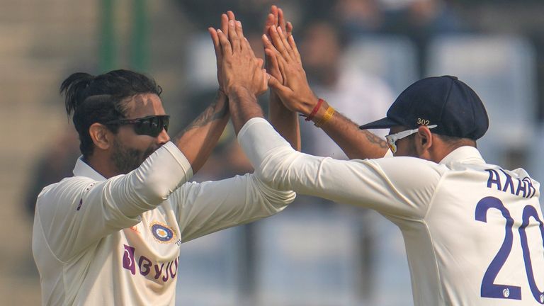 India's Ravindra Jadeja, left, and Axar Patel celebrate the dismissal of Australia's Marnus Labuschagne during the third day of the second cricket test match between India and Australia in New Delhi, India, Sunday, Feb. 19, 2023. (AP Photo/Altaf Qadri)