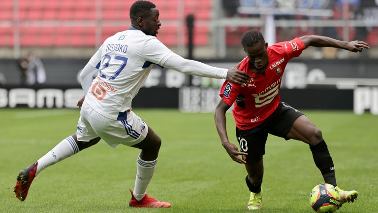 Rennes' Kamaldeen Sulemana, right, is challenged by Strasbourg's Ibrahima Sissoko during the French League One soccer match between Rennes and Strasbourg at the Roazhon Park stadium in Rennes, Germany, Sunday, Oct. 24, 2021. 