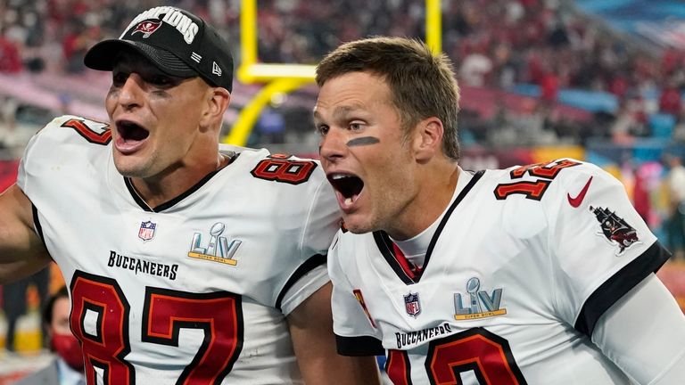 FILE - Tampa Bay Buccaneers tight end Rob Gronkowski, left, and quarterback Tom Brady celebrate after defeating the Kansas City Chiefs in the NFL Super Bowl 55 football game Sunday, Feb. 7, 2021, in Tampa, Fla. Brady, the seven-time Super Bowl winner