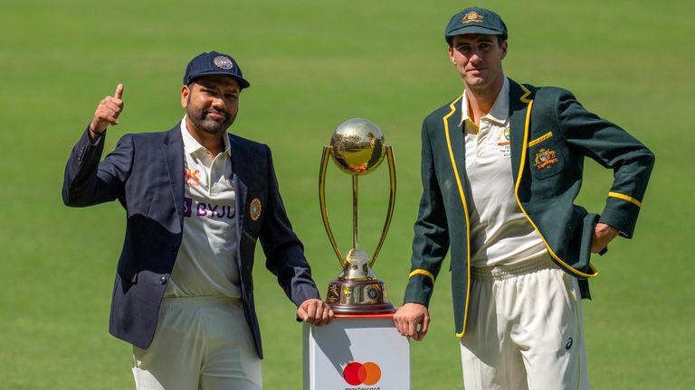 India's captain Rohit Sharma, left, and Australia's captain Pat Cummins pose for a photo with the Border...Gavaskar Trophy before their first cricket test match in Nagpur, India, Wednesday, Feb. 2023. (AP Photo/Rafiq Maqbool)