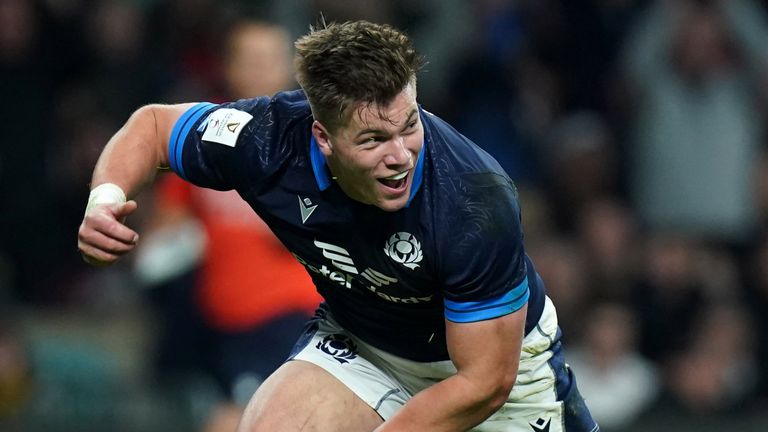 Huw Jones celebrates after scoring Scotland's opening try at Twickenham