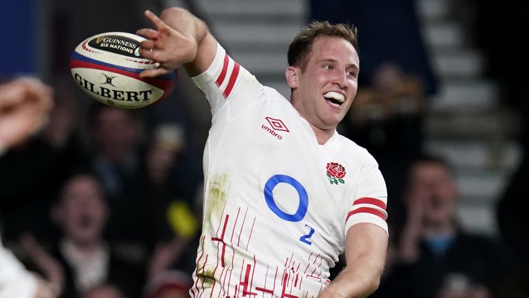 Max Malins celebrates after scoring a try for England against Scotland