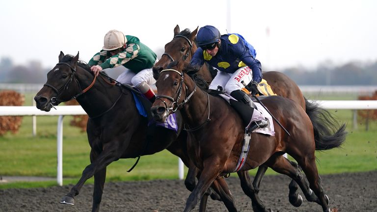 Spirit Of Nguru, ridden by jockey Tom Marquand (right), wins the Unibet/EBF Novice Stakes at Kempton