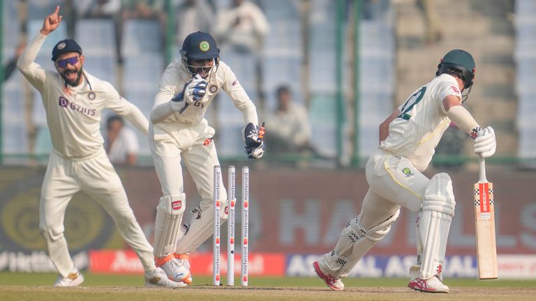 India's wicketkeeper Srikar Bharat, center, celebrate the wicket Australia's Travis Head, right, during the third day of the second cricket test match between India and Australia in New Delhi, India, Sunday, Feb. 19, 2023. (AP Photo/Altaf Qadri)