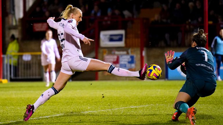 West Ham goalkeeper Mackenzie Arnold saves a shot from Arsenal's Stina Blackstenius